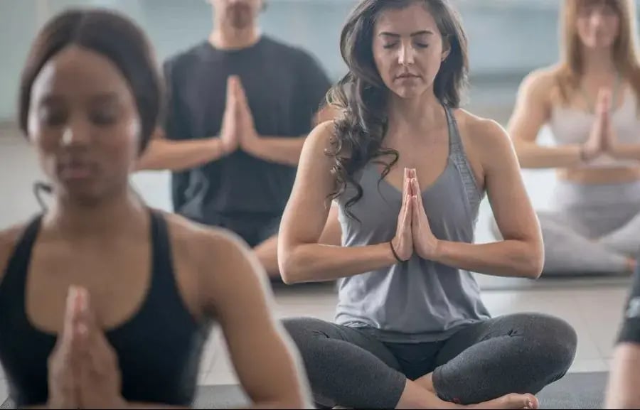 Group meditating together